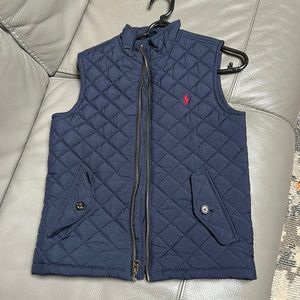 Gently used Size 7 quilted Navy Blue vest.